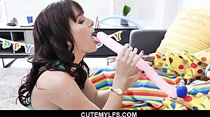 Busty MILF seduces a clown with her skills
